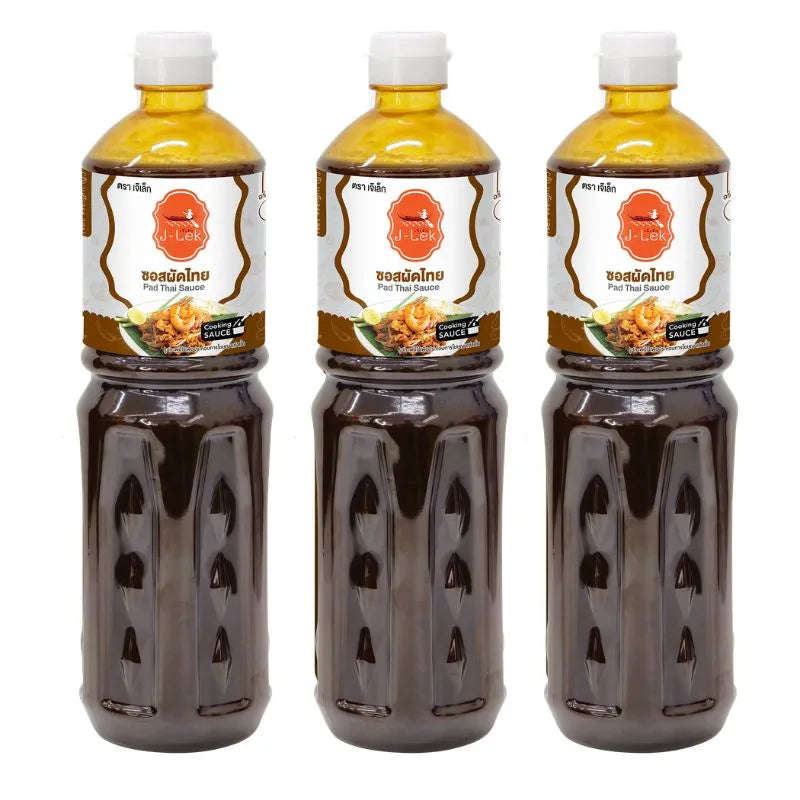 J-LEK Pad Thai sauce bottles, 1150g each, pack of 3, featuring rich, flavorful Thai-style sauce in clear bottles.